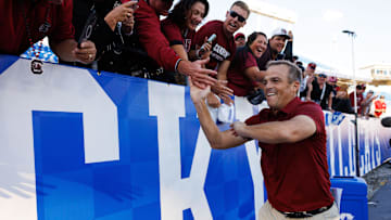 Sep 7, 2024; Lexington, Kentucky, USA; South Carolina Gamecocks head coach Shane Beamer high fives fans after the game against the Kentucky Wildcats at Kroger Field. Mandatory Credit: Jordan Prather-Imagn Images