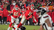 Jan 18, 2025; Kansas City, Missouri, USA; Kansas City Chiefs quarterback Patrick Mahomes (15) throws a touchdown pass against the Houston Texans during the fourth quarter of a 2025 AFC divisional round game at GEHA Field at Arrowhead Stadium. Mandatory Credit: Denny Medley-Imagn Images