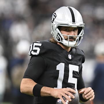 Aug 17, 2024; Paradise, Nevada, USA; Las Vegas Raiders quarterback Gardner Minshew (15) warms up against the Dallas Cowboys at Allegiant Stadium. Mandatory Credit: Candice Ward-Imagn Images