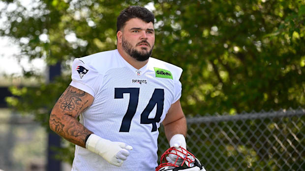 New England Patriots offensive lineman Jack Conley (74) walks to the practice field.
