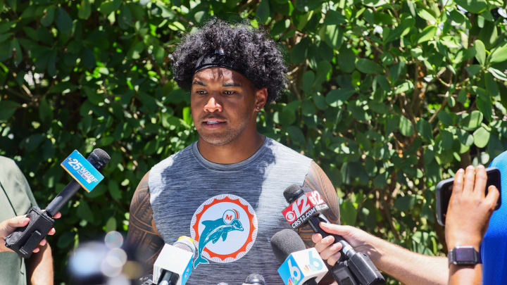 Jun 4, 2024; Miami Gardens, FL, USA; Miami Dolphins quarterback Tua Tagovailoa (1) speaks to reporters during mandatory minicamp at Baptist Health Training Complex.