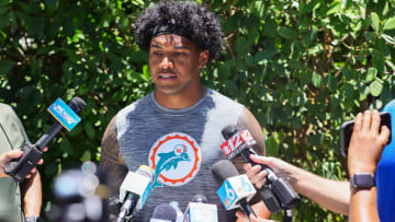 Miami Dolphins quarterback Tua Tagovailoa speaks to reporters during mandatory minicamp at the Baptist Health Training Complex. 