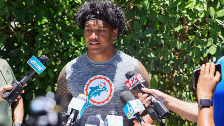 Miami Dolphins quarterback Tua Tagovailoa speaks to reporters during mandatory minicamp at the Baptist Health Training Complex. 