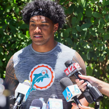 Miami Dolphins quarterback Tua Tagovailoa speaks to reporters after a minicamp practice at Baptist Health Training Complex. 