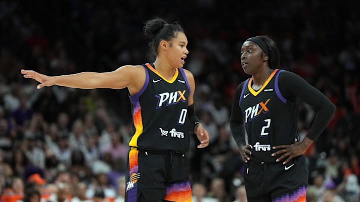 Jun 29, 2025; Phoenix, Arizona, USA; Phoenix Mercury forward Satou Sabally (0) and guard Kahleah Copper (2) talk against the Las Vegas Aces in the second half at Footprint Center. Mandatory Credit: Rick Scuteri-Imagn Images