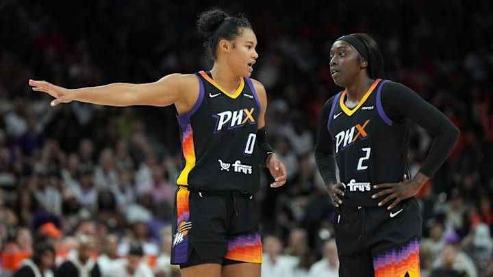 Jun 29, 2025; Phoenix, Arizona, USA; Phoenix Mercury forward Satou Sabally (0) and guard Kahleah Copper (2) talk against the Las Vegas Aces in the second half at Footprint Center. Mandatory Credit: Rick Scuteri-Imagn Images