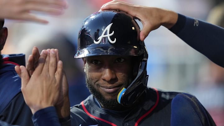 Aug 30, 2025; Philadelphia, Pennsylvania, USA; Atlanta Braves outfielder Jurickson Profar (7) celebrates with teammates after scoring against the Philadelphia Phillies in the sixth inning at Citizens Bank Park. Mandatory Credit: Kyle Ross-Imagn Images