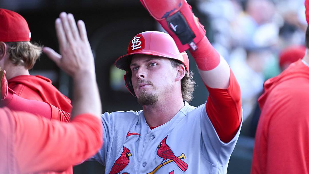 May 13, 2026; West Sacramento, California, USA; St. Louis Cardinals third baseman Nolan Gorman (16) celebrates with teammates after scoring against the Athletics during the fourth inning at Sutter Health Park. Mandatory Credit: Ed Szczepanski-Imagn Images