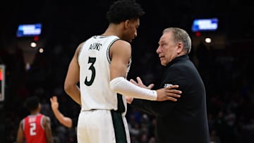 Mar 23, 2025; Cleveland, OH, USA;Michigan State Spartans guard Jaden Akins (3) talks with head coach Tom Izzo in the second half against the New Mexico Lobos  during the NCAA Tournament Second Round at Rocket Arena. Mandatory Credit: Ken Blaze-Imagn Images