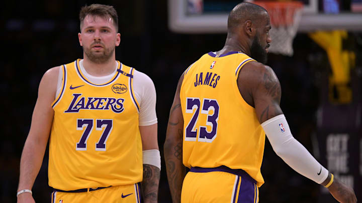 Feb 10, 2025; Los Angeles, California, USA; Los Angeles Lakers guard Luka Doncic (77) and forward LeBron James (23) on the court in the first half against the Utah Jazz at Crypto.com Arena. Mandatory Credit: Jayne Kamin-Oncea-Imagn Images