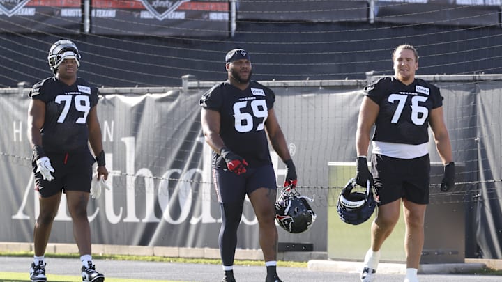 Jul 23, 2025; Houston, TX, USA; Houston Texans offensive tackle Aireontae Ersery (79) and guard Ed Ingram (69) and tackle Austin Deculus (76) during training camp at Houston Methodist Training Center. Mandatory Credit: Troy Taormina-Imagn Images Jul 23, 2025; Houston, TX, USA; Houston Texans offensive tackle Aireontae Ersery (79) and guard Ed Ingram (69) and tackle Austin Deculus (76) during training camp at Houston Methodist Training Center. Mandatory Credit: Troy Taormina-Imagn Images