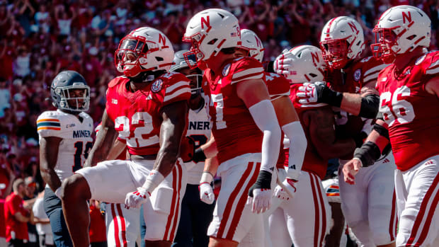 Nebraska Cornhuskers running back Gabe Ervin Jr. (22) celebrates after scoring a touchdown