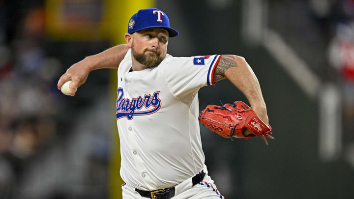 Jul 6, 2024; Arlington, Texas, USA; Texas Rangers relief pitcher Kirby Yates (39) pitches against the Tampa Bay Rays during the ninth inning at Globe Life Field.