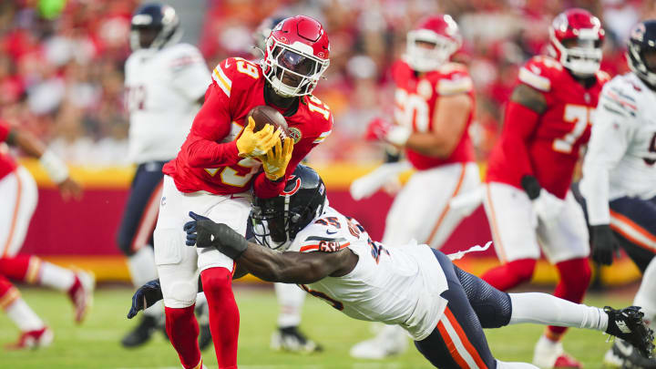 Aug 22, 2024; Kansas City, Missouri, USA; Kansas City Chiefs wide receiver Kadarius Toney (19) is tackled by Chicago Bears linebacker Amen Ogbongbemiga (45) at GEHA Field at Arrowhead Stadium. Mandatory Credit: Jay Biggerstaff-USA TODAY Sports