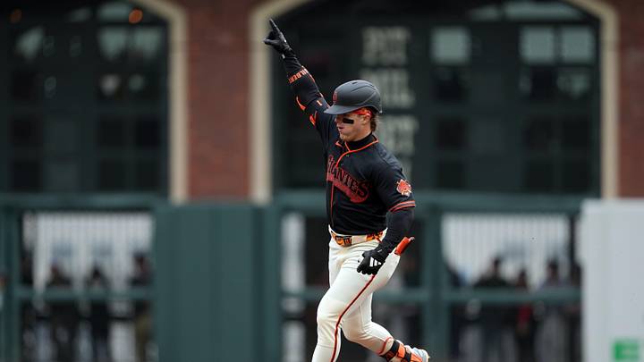 Apr 25, 2026; San Francisco, California, USA; San Francisco Giants center fielder Drew Gilbert (0) gestures while rounding the bases after hitting a home run against the Miami Marlins during the fifth inning at Oracle Park. Mandatory Credit: Darren Yamashita-Imagn Images