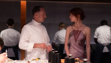 Ralph Fiennes and Anya Taylor-Joy in the film THE MENU. Photo by Eric Zachanowich. Courtesy of Searchlight Pictures