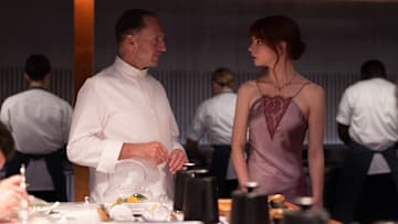 Ralph Fiennes and Anya Taylor-Joy in the film THE MENU. Photo by Eric Zachanowich. Courtesy of Searchlight Pictures. © 2022 20th Century Studios All Rights Reserved