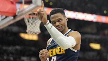 Jan 4, 2025; San Antonio, Texas, USA; Denver Nuggets guard Russell Westbrook (4) interacts with a fan before a game the San Antonio Spurs at Frost Bank Center. Mandatory Credit: Scott Wachter-Imagn Images