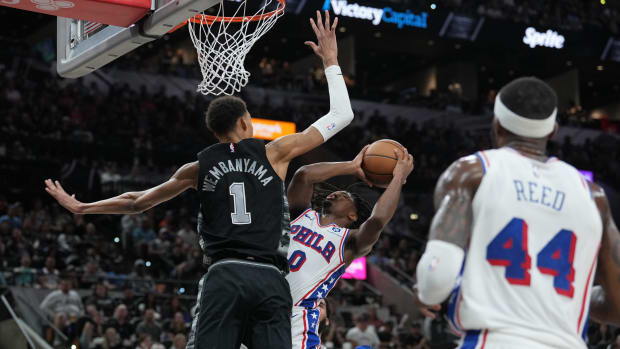 Apr 7, 2024; San Antonio, Texas, USA;  Philadelphia 76ers guard Tyrese Maxey (0) shoots against San