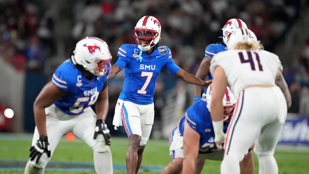Jan 2, 2026; San Diego, CA, USA; SMU Mustangs quarterback Kevin Jennings (7) prepares to take the snap against the Arizona Wildcats in the first half during the Holiday Bowl at Snapdragon Stadium. Mandatory Credit: Kirby Lee-Imagn Images Jan 2, 2026; San Diego, CA, USA; SMU Mustangs quarterback Kevin Jennings (7) prepares to take the snap against the Arizona Wildcats in the first half during the Holiday Bowl at Snapdragon Stadium. Mandatory Credit: Kirby Lee-Imagn Images