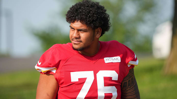 Jul 22, 2024; St. Joseph, MO, USA; Kansas City Chiefs offensive tackle Kingsley Suamataia (76) walks down the hill from the locker room to the fields prior to training camp at Missouri Western State University. Mandatory Credit: Denny Medley-Imagn Images