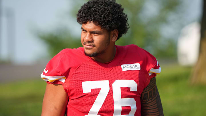 Kansas City Chiefs offensive tackle Kingsley Suamataia (76) walks down the hill from the locker room to the fields prior to training camp at Missouri Western State University.