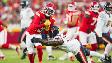 Aug 22, 2024; Kansas City, Missouri, USA; Kansas City Chiefs wide receiver Kadarius Toney (19) is tackled by Chicago Bears linebacker Amen Ogbongbemiga (45) at GEHA Field at Arrowhead Stadium. Mandatory Credit: Jay Biggerstaff-USA TODAY Sports