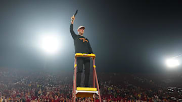 Nov 29, 2025; Los Angeles, California, USA; Southern California Trojans head coach Lincoln Riley leads the Spirit of Troy marching band in a rendition of Tribute to Troy after teh game against the UCLA Bruins at United Airlines Field at Los Angeles Memorial Coliseum. Mandatory Credit: Kirby Lee-Imagn Images