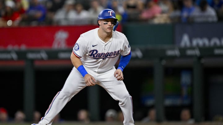 Jul 6, 2024; Arlington, Texas, USA; Texas Rangers catcher Andrew Knizner (12) in action during the game between the Texas Rangers and the Tampa Bay Rays at Globe Life Field. Mandatory Credit: Jerome Miron-USA TODAY Sports