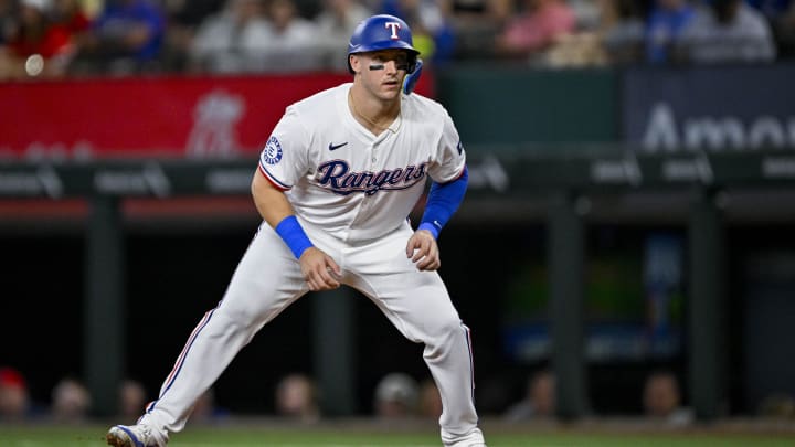 Jul 6, 2024; Arlington, Texas, USA; Texas Rangers catcher Andrew Knizner (12) in action during the game between the Texas Rangers and the Tampa Bay Rays at Globe Life Field. Mandatory Credit: Jerome Miron-USA TODAY Sports