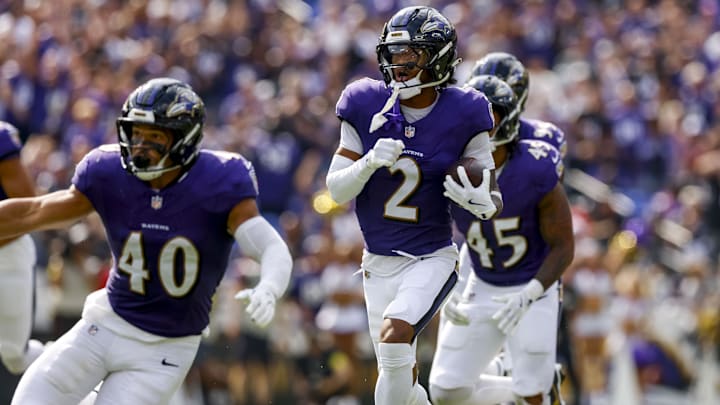 Sep 14, 2025; Baltimore, Maryland, USA; Baltimore Ravens cornerback Nate Wiggins (2) runs the ball during the third quarter at M&T Bank Stadium. Mandatory Credit: Peter Casey-Imagn Images