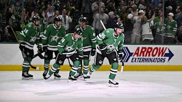 Mar 24, 2025; Dallas, Texas, USA; Dallas Stars center Matt Duchene (95) and defenseman Cody Ceci (44) and left wing Jamie Benn (14) and defenseman Ilya Lyubushkin (46) center Mikael Granlund (64) celebrates a goal scored by Duchene against the Minnesota Wild during the second period at the American Airlines Center. Mandatory Credit: Jerome Miron-Imagn Images