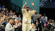 Aug 10, 2024; Paris, France; Carmelo Anthony cheers in the second half against France in the men's basketball gold medal game during the Paris 2024 Olympic Summer Games at Accor Arena. Mandatory Credit: Rob Schumacher-USA TODAY Sports