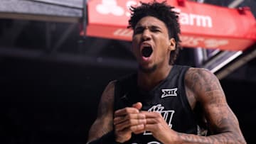 Cincinnati Bearcats forward Dillon Mitchell (23) reacts to a defensive stop in the second half of the NCAA Basketball game at Fifth Third Arena in Cincinnati on Saturday, Dec. 14, 2024. Cincinnati Bearcats defeated Xavier Musketeers 68-65.