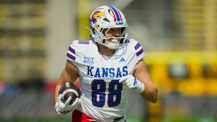 Sep 6, 2025; Columbia, Missouri, USA; Kansas Jayhawks tight end Boden Groen (88) runs with the ball during the first half against the Missouri Tigers at Faurot Field at Memorial Stadium. Mandatory Credit: Jay Biggerstaff-Imagn Images