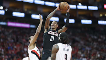 Nov 14, 2025; Houston, Texas, USA;  Houston Rockets forward Jabari Smith Jr. (10) attempts to score as Portland Trail Blazers forward Kris Murray (24) defends during the second quarter at Toyota Center. Mandatory Credit: Troy Taormina-Imagn Images