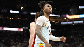 Apr 13, 2025; San Antonio, Texas, USA; San Antonio Spurs guard Stephon Castle (5) looks to the scoreboard during the second half against the Toronto Raptors at Frost Bank Center. Mandatory Credit: Scott Wachter-Imagn Images