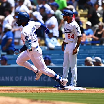 Aug 10, 2025; Los Angeles, California, USA; Los Angeles Dodgers right fielder Teoscar Hernandez (37) rounds first base on a double during the first inning against the Toronto Blue Jays at Dodger Stadium. Mandatory Credit: Jonathan Hui-Imagn Images