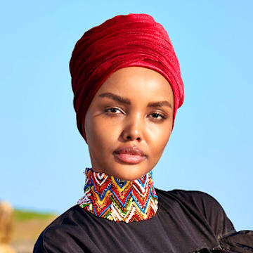 Halima Aden was photographed by Yu Tsai in Kenya. Burkini by No Ka'Oi.