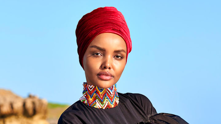 Halima Aden was photographed by Yu Tsai in Kenya. Burkini by No Ka'Oi. Halima Aden was photographed by Yu Tsai in Kenya. Burkini by No Ka'Oi.