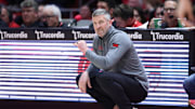 Mar 4, 2025; Salt Lake City, Utah, USA; Utah Utes guard head coach Josh Eilert looks on against the West Virginia Mountaineers during the first half at Jon M. Huntsman Center. Mandatory Credit: Rob Gray-Imagn Images