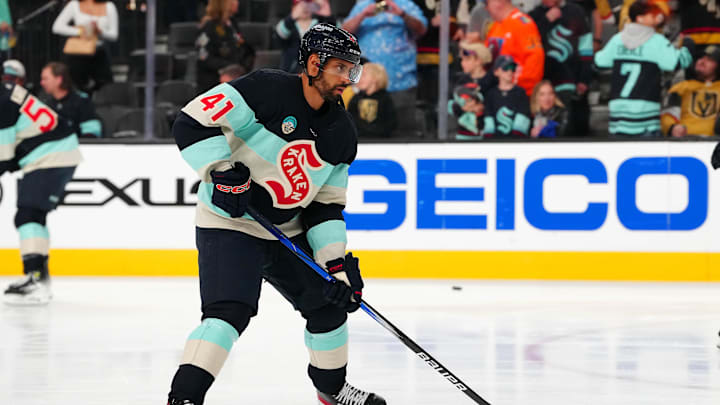 Mar 21, 2024; Las Vegas, Nevada, USA; Seattle Kraken left wing Pierre-Edouard Bellemare (41) warms up before a game against the Vegas Golden Knights at T-Mobile Arena. Mandatory Credit: Stephen R. Sylvanie-Imagn Images