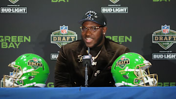 Tyler Booker speaks in a press conference after being selected by the Dallas Cowboys at No. 12 overall.