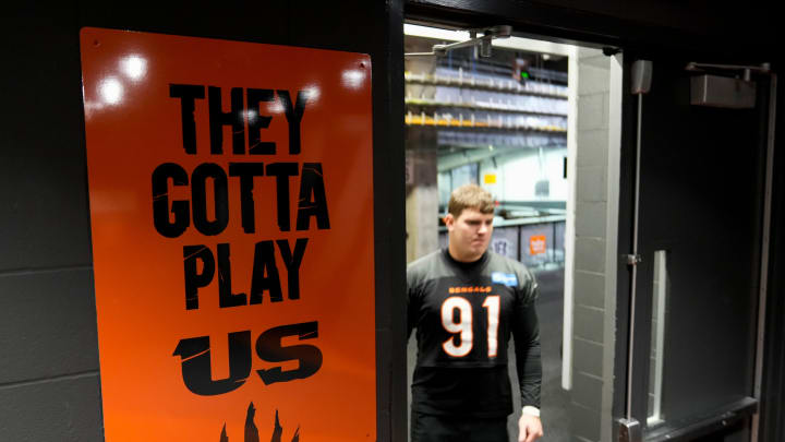 Cincinnati Bengals defensive end Trey Hendrickson enters the locker room past a mounted sign reading,    The Gotta Play Us    at PayCor Stadium in downtown Cincinnati on Wednesday, Jan. 25, 2023.

Bengals They Gotta Play Us