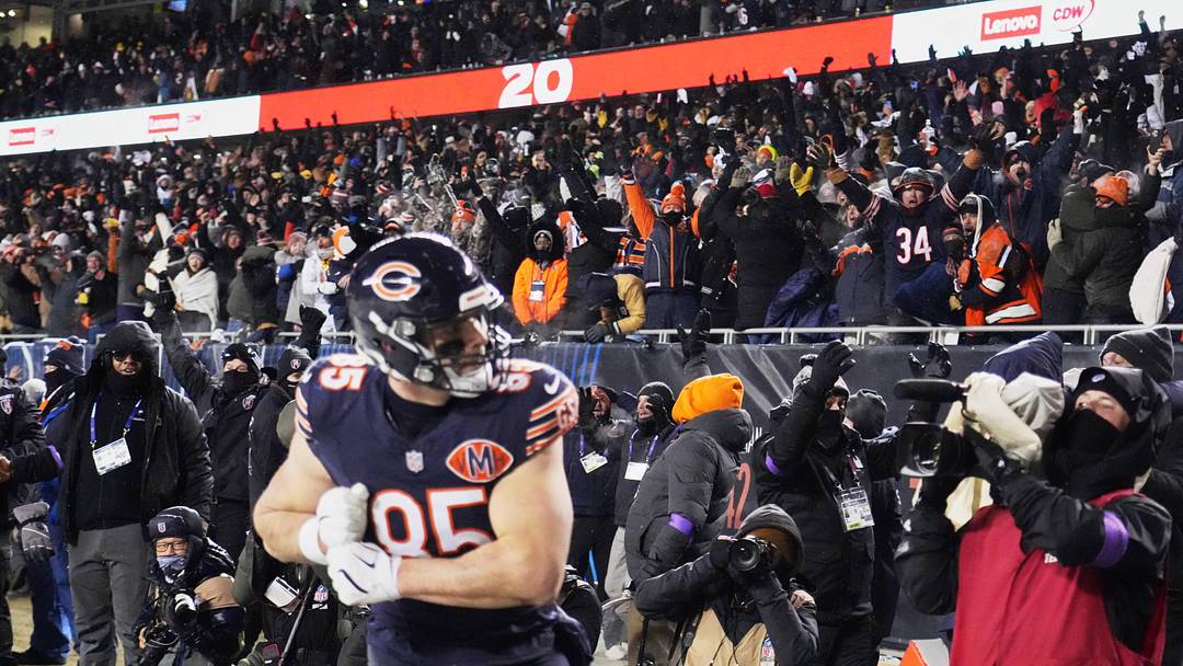 Jan 18, 2026; Chicago, IL, USA; Fans cheer after a touchdown scored by Chicago Bears tight end Cole Kmet (85) against the Los Angeles Rams with eighteen seconds remaining in the fourth quarter of an NFC Divisional Round game at Soldier Field. Mandatory Credit: David Banks-Imagn Images