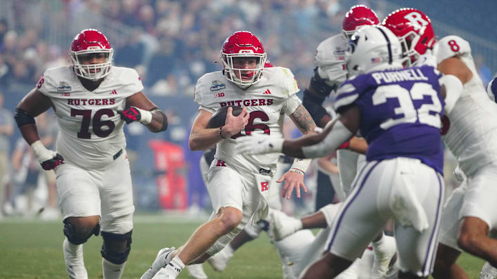 Rutgers quarterback Athan Kaliakmanis (16) scrambles against Kansas State during first half of the Rate Bowl at Chase Field on Dec. 26, 2024, in Phoenix. Rutgers quarterback Athan Kaliakmanis (16) scrambles against Kansas State during first half of the Rate Bowl at Chase Field on Dec. 26, 2024, in Phoenix.
