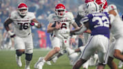Rutgers quarterback Athan Kaliakmanis (16) scrambles against Kansas State during first half of the Rate Bowl at Chase Field on Dec. 26, 2024, in Phoenix.