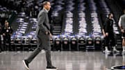 Feb 10, 2025; Dallas, Texas, USA; Dallas Mavericks general manager Nico Harrison walks onto the court before the game between the Dallas and the Sacramento Kings at the American Airlines Center. Mandatory Credit: Jerome Miron-Imagn Images