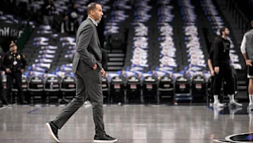 Feb 10, 2025; Dallas, Texas, USA; Dallas Mavericks general manager Nico Harrison walks onto the court before the game between the Dallas and the Sacramento Kings at the American Airlines Center. Mandatory Credit: Jerome Miron-Imagn Images