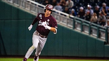 Jun 19, 2024; Omaha, NE, USA; Texas A&M Aggies shortstop Ali Camarillo (2) rounds second after hitting a triple against the Florida Gators during the ninth inning at Charles Schwab Field Omaha. Mandatory Credit: Dylan Widger-USA TODAY Sports